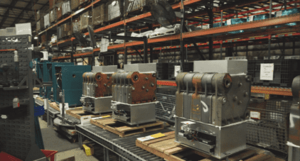 boiler assembly line with boilers on it